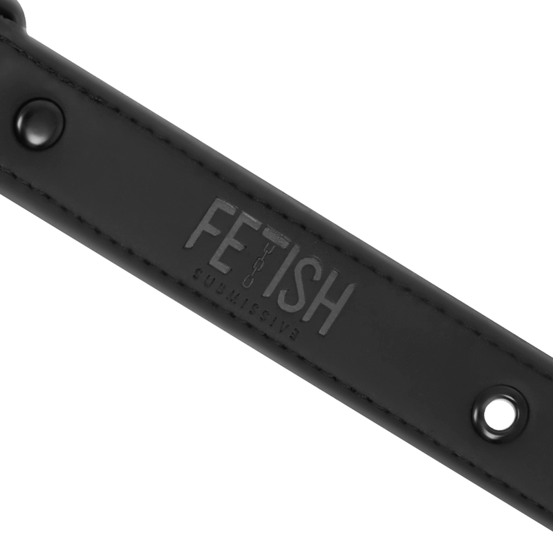 Detail of the FETISH SUBMISSIVE logo on vegan leather ball gag strap