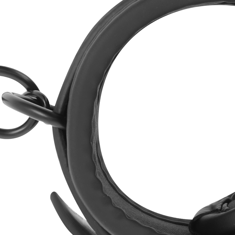 Close-up of inner padding and metal ring of BDSM wrist cuff