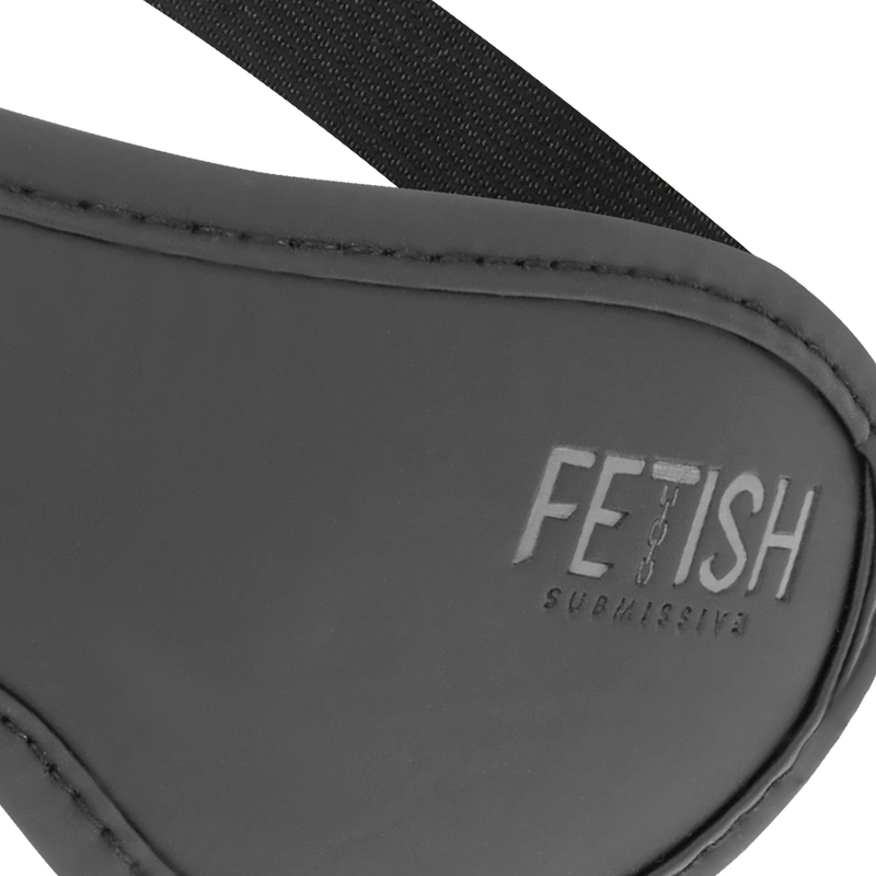 Close-up of FETISH SUBMISSIVE branding on vegan leather eye mask