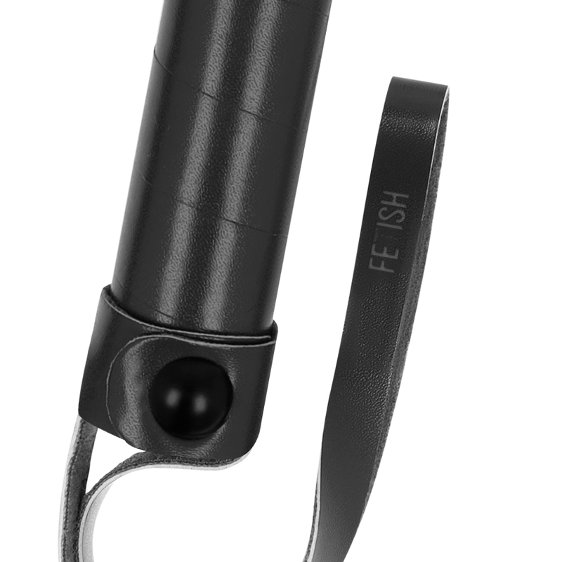 Close-up of the leather handle and wrist strap – Fetish Submissive whip